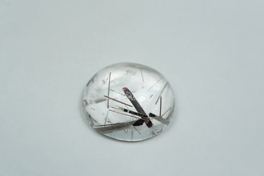 29.05ct Quartzo com inclusão cabochão 22x19mm