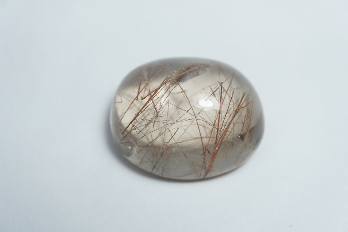 Quartzo com inclusão em cabochão 36,50ct 24x11mm