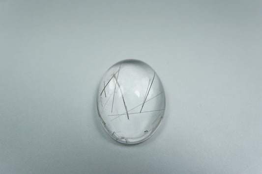 11.15ct Quartzo com inclusão cabochão 17.5x13mm