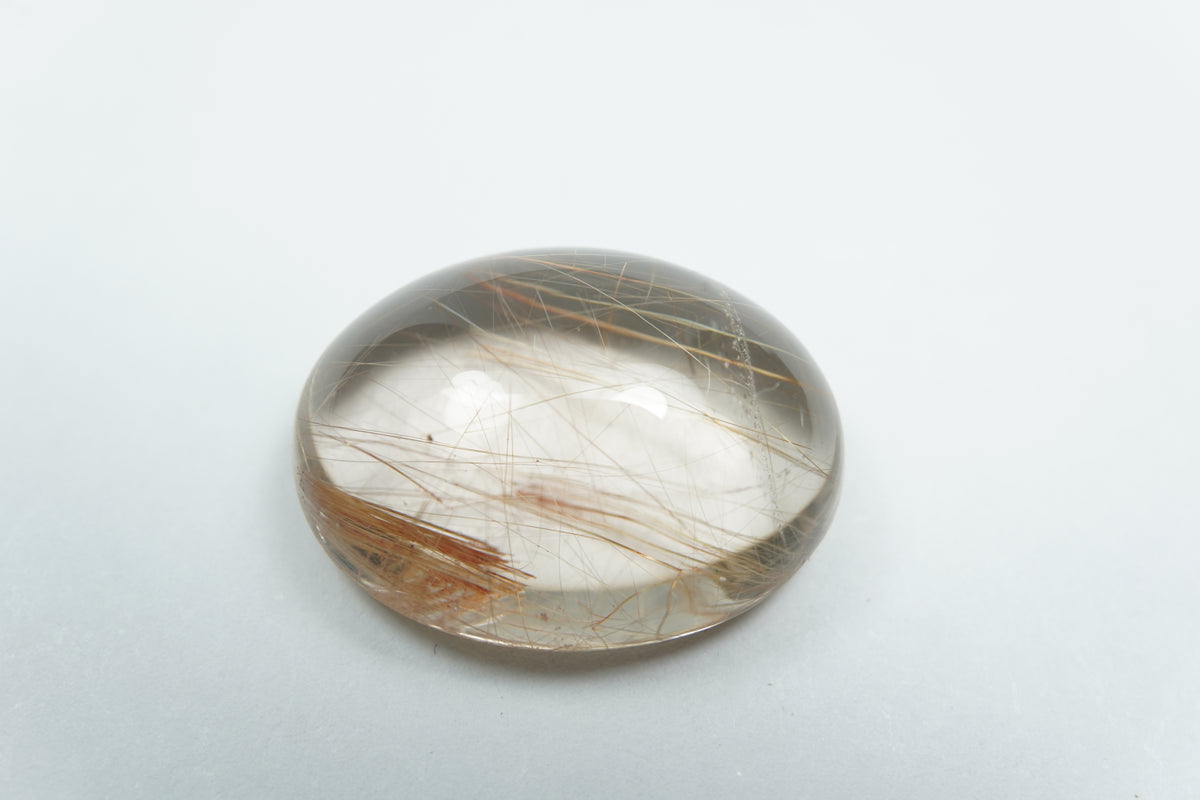 18.41ct Quartzo com rutilo cabochão 20x15mm