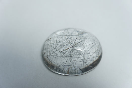20.50ct Quartzo com inclusão cabochão 21x18mm