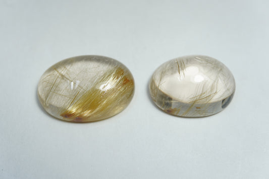 21.38ct Rutilo cabochão 16x13mm / 18x14mm