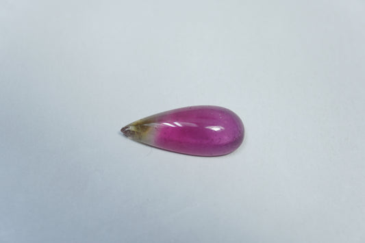 3.25ct Turmalina bicolor cabochão 16x7mm