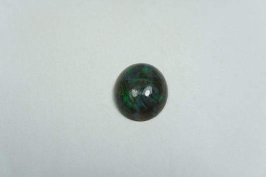 2.65ct Opala cabochão 11.5x10mm