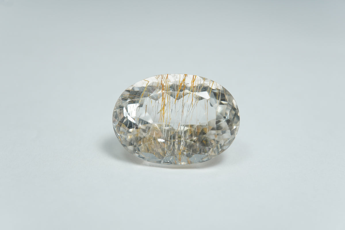 21.81ct Topaz With Golden Rutile 19x14mm