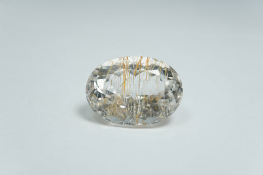 21.81ct Topázio com rutilo dourado 19x14mm