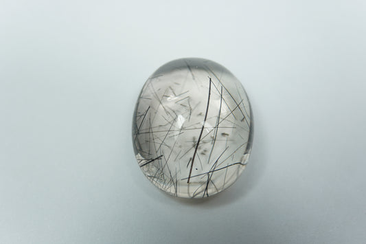 30.60ct Quartzo com inclusão cabochão 23x19mm