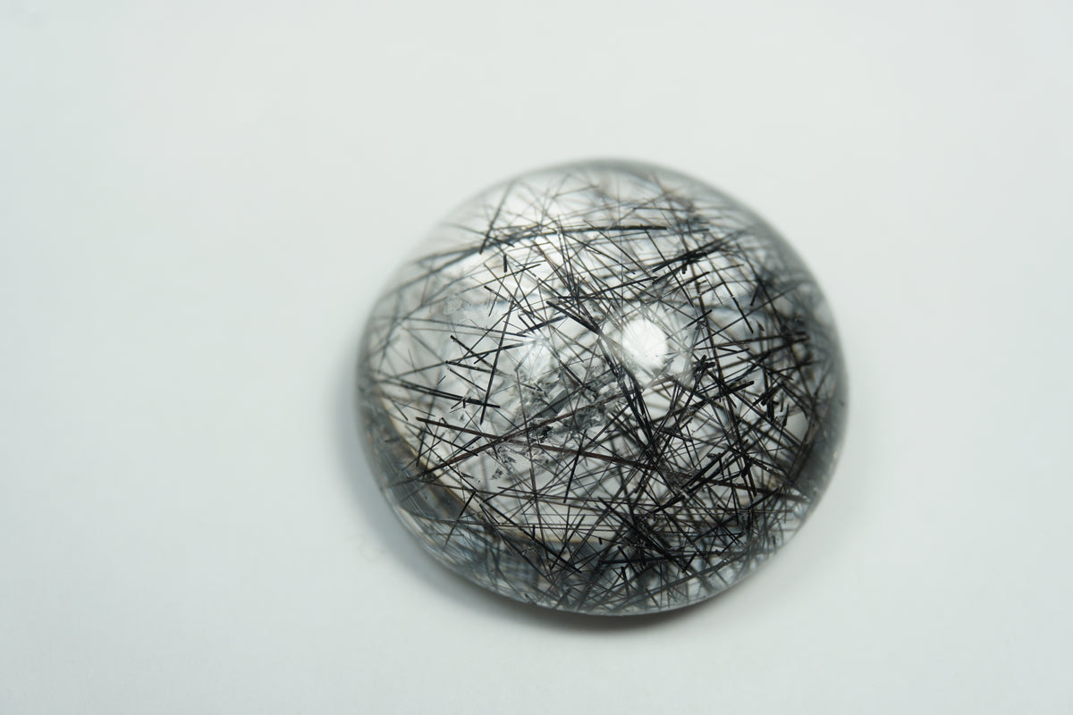 41.10ct Quartz with inclusion cabochon 23mm