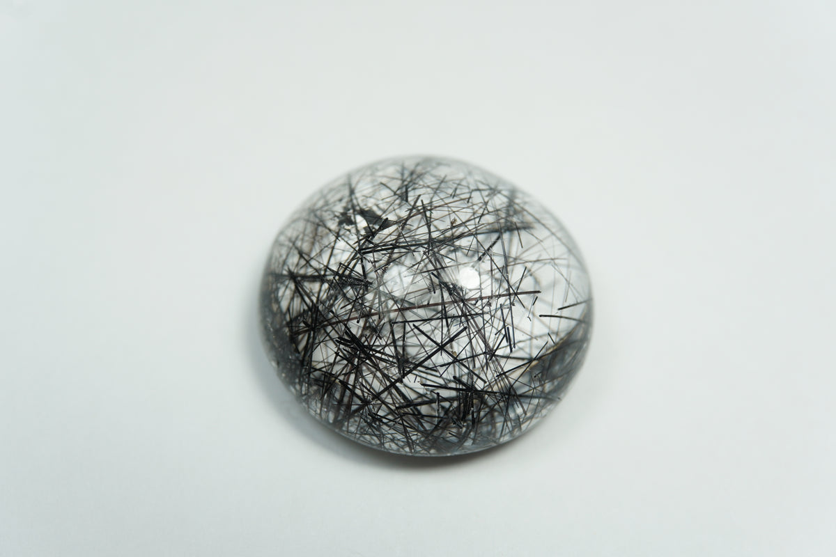 41.10ct Quartz with inclusion cabochon 23mm