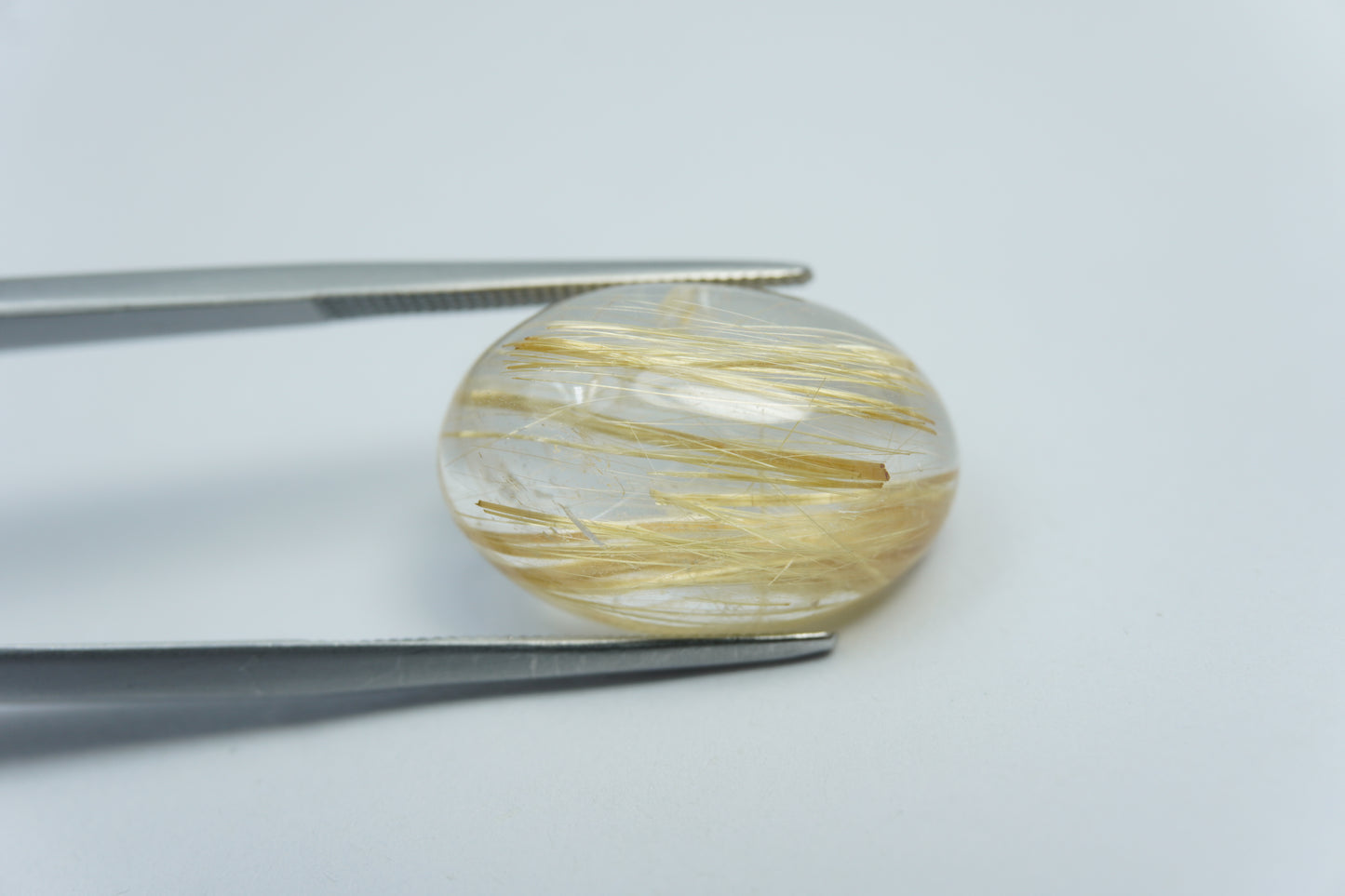 14.75ct Rutilo cabochão 19x13mm
