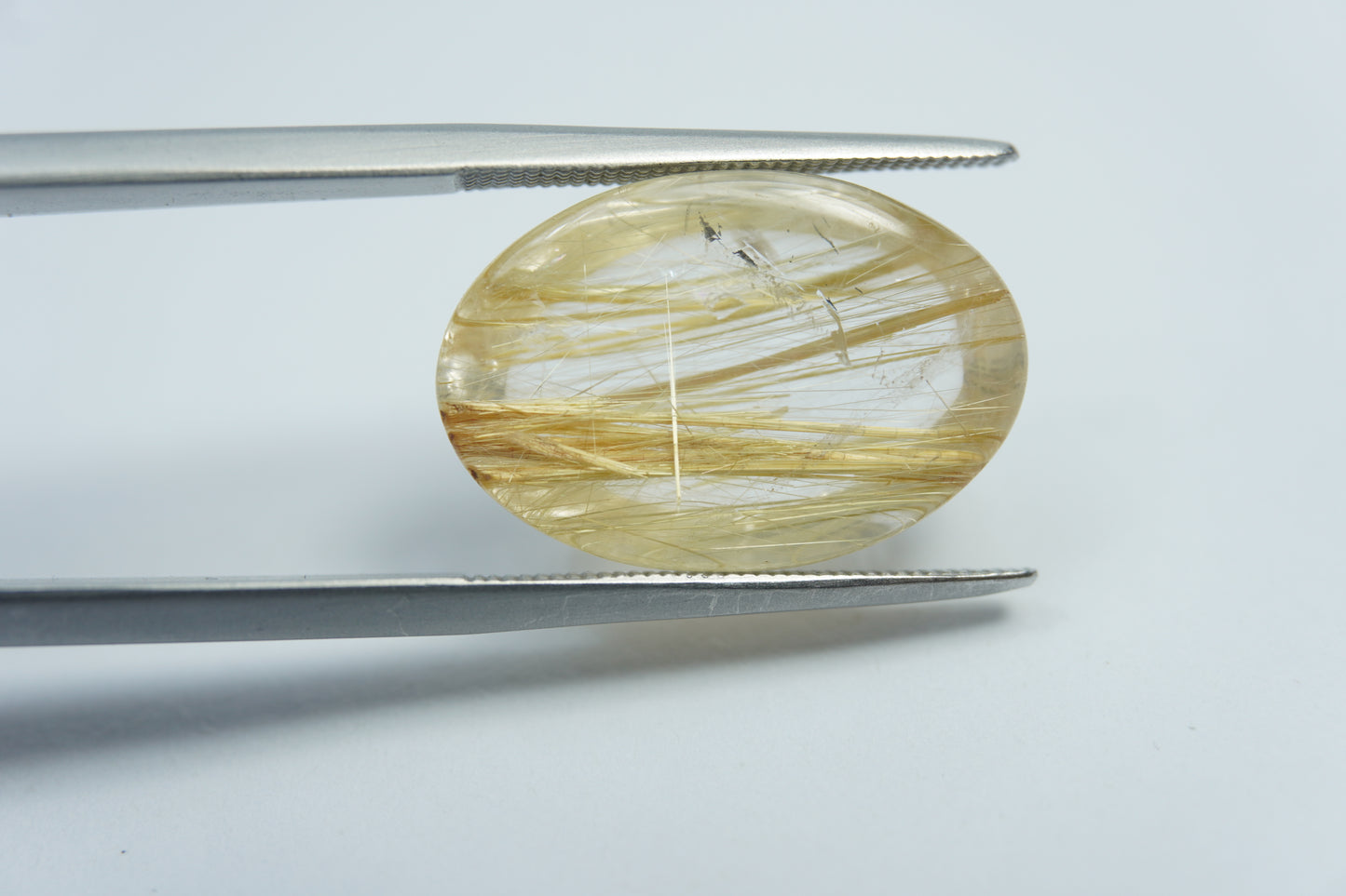 14.75ct Rutilo cabochão 19x13mm