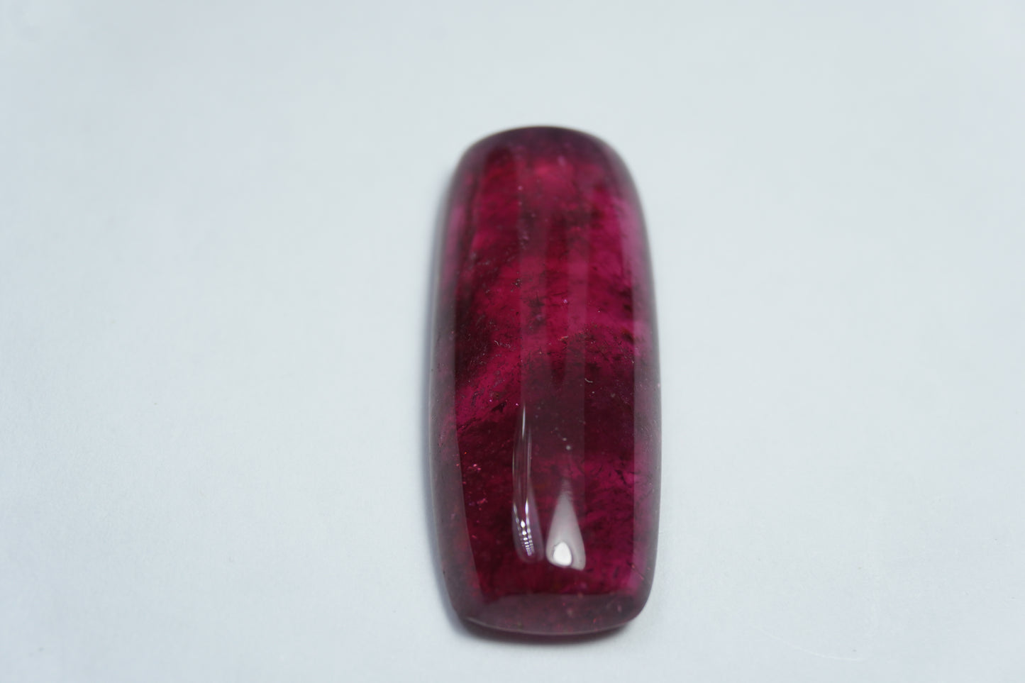 21.35ct Rubellite cabochon 30x12mm