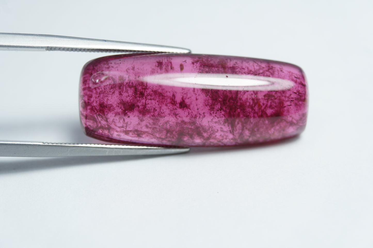 21.35ct Rubellite cabochon 30x12mm