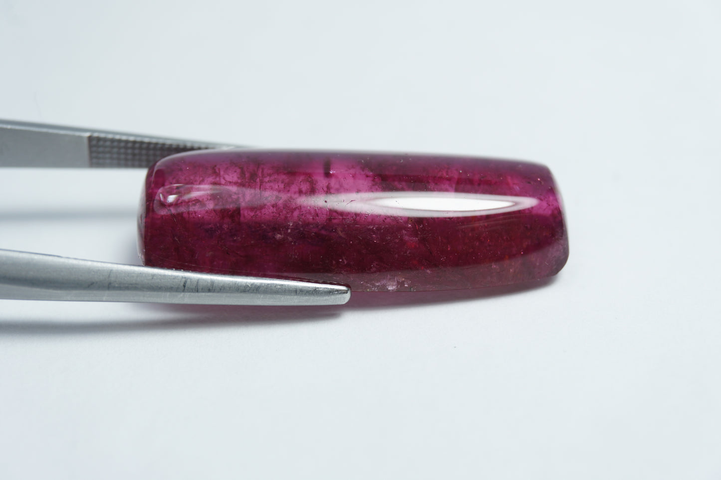 21.35ct Rubellite cabochon 30x12mm