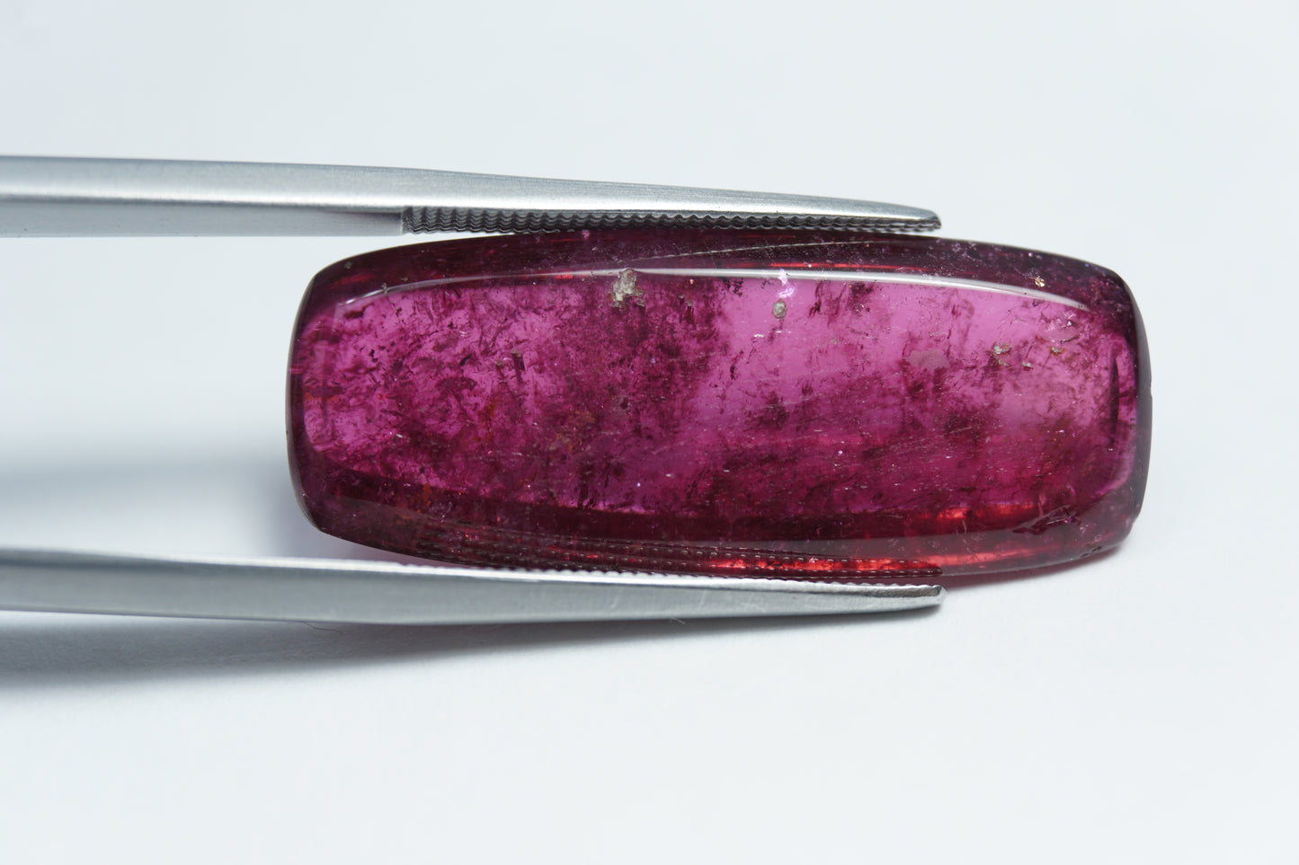 21.35ct Rubellite cabochon 30x12mm