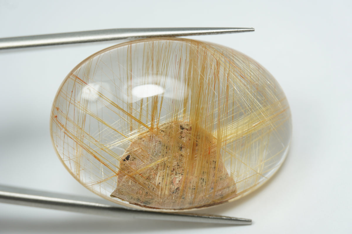 56.50ct Rutilo cabochão 34x24mm