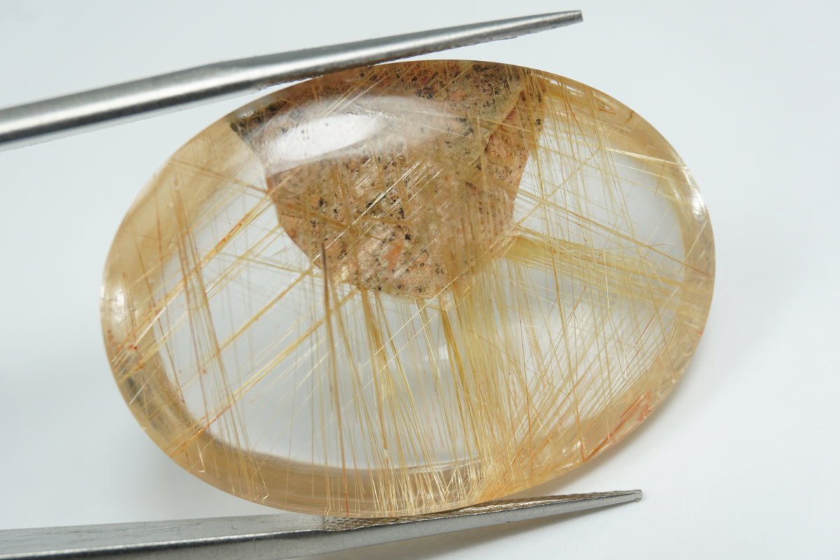 56.50ct Rutilo cabochão 34x24mm