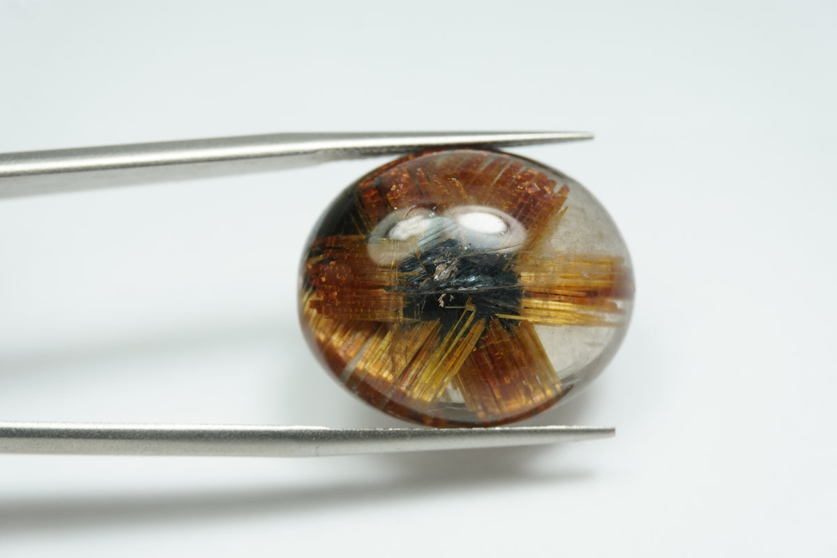 20.65ct Rutile cabochon 21x17mm