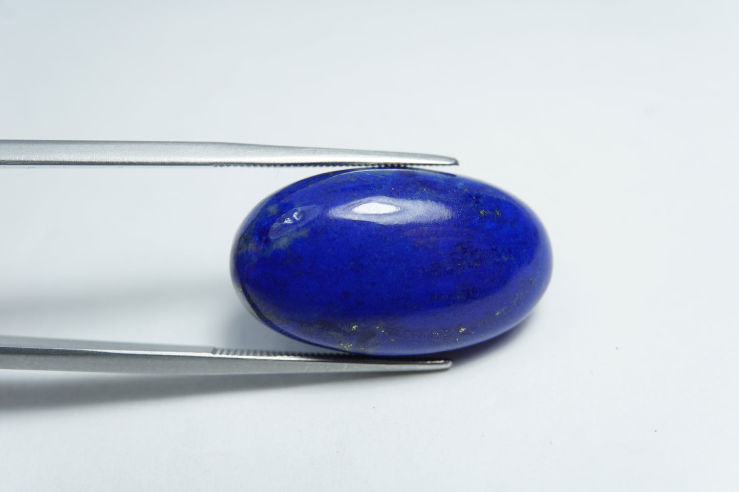 24.75ct Lápis-lazúli cabochão 29x14mm