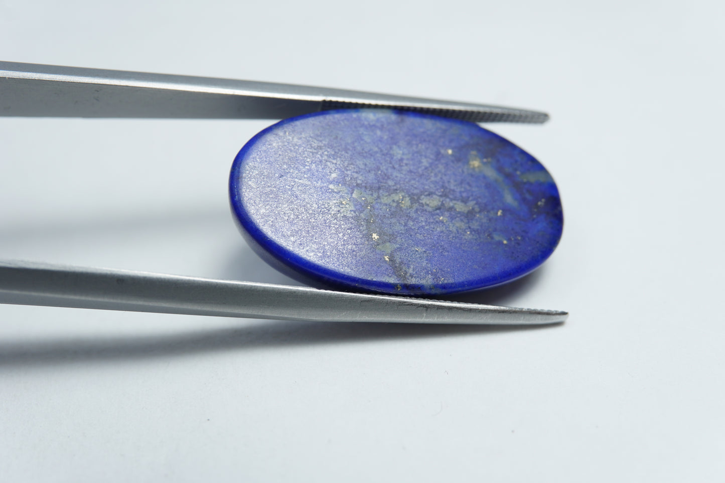 24.75ct Lápis-lazúli cabochão 29x14mm