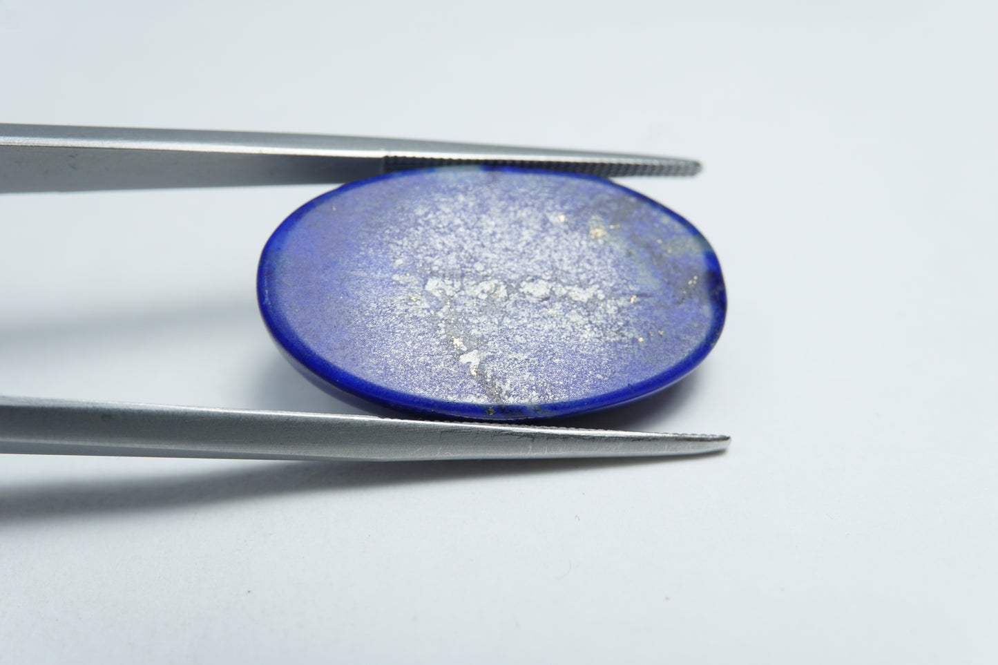 24.75ct Lápis-lazúli cabochão 29x14mm