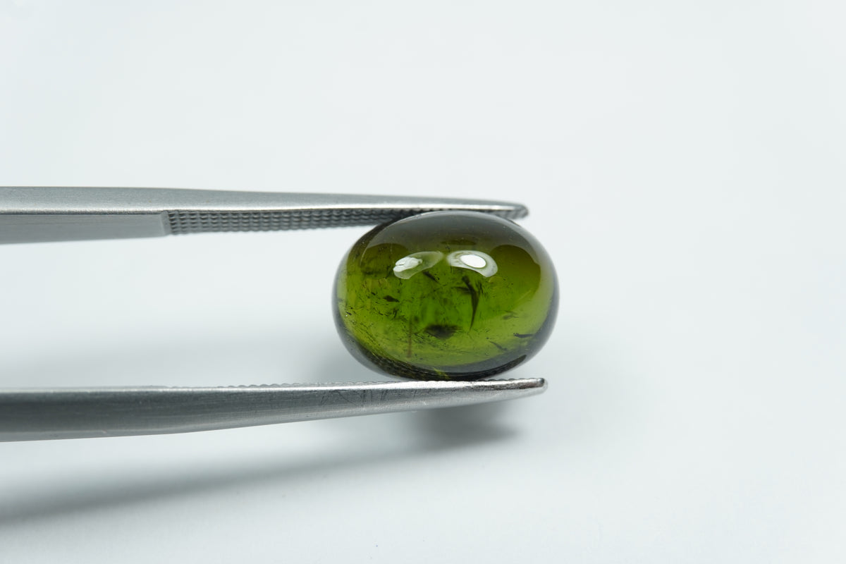 5.38ct Turmalina cabochão 11x9mm
