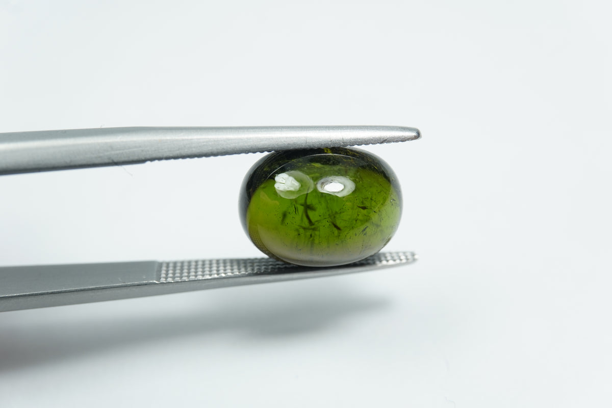 5.38ct Turmalina cabochão 11x9mm