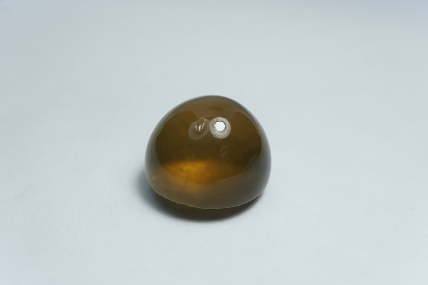 37.25ct Quartz cabochon with stripe 19mm