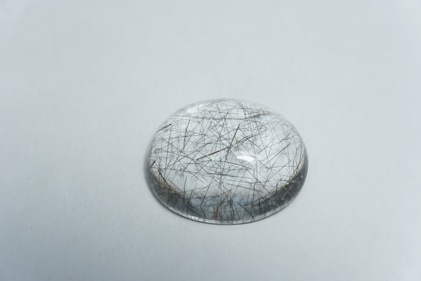 20.50ct Quartzo com inclusão cabochão 21x18mm