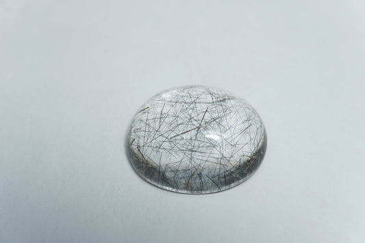 20.50ct Quartzo com inclusão cabochão 21x18mm
