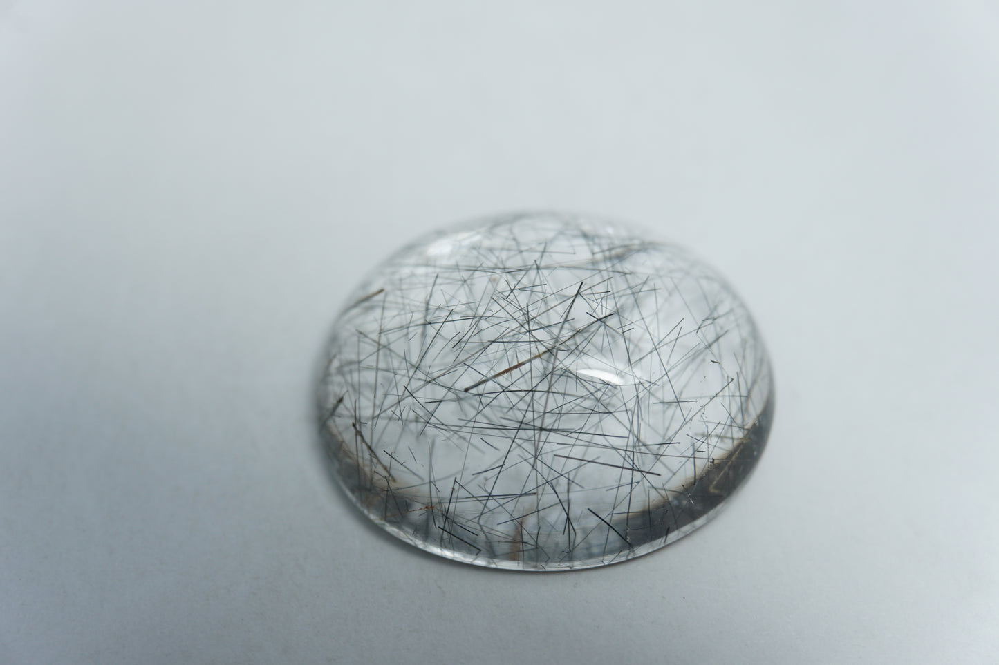 20.50ct Quartzo com inclusão cabochão 21x18mm