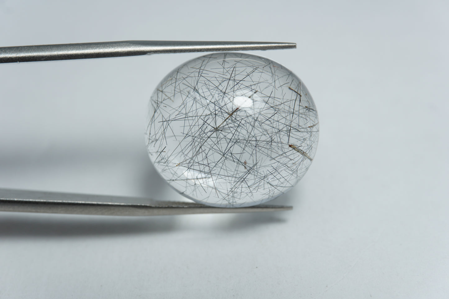 20.50ct Quartzo com inclusão cabochão 21x18mm