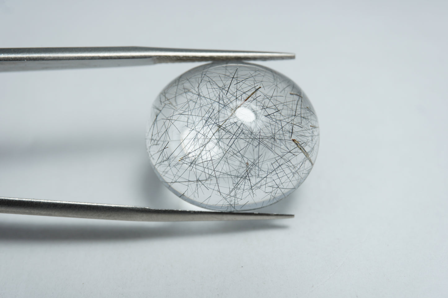 20.50ct Quartzo com inclusão cabochão 21x18mm