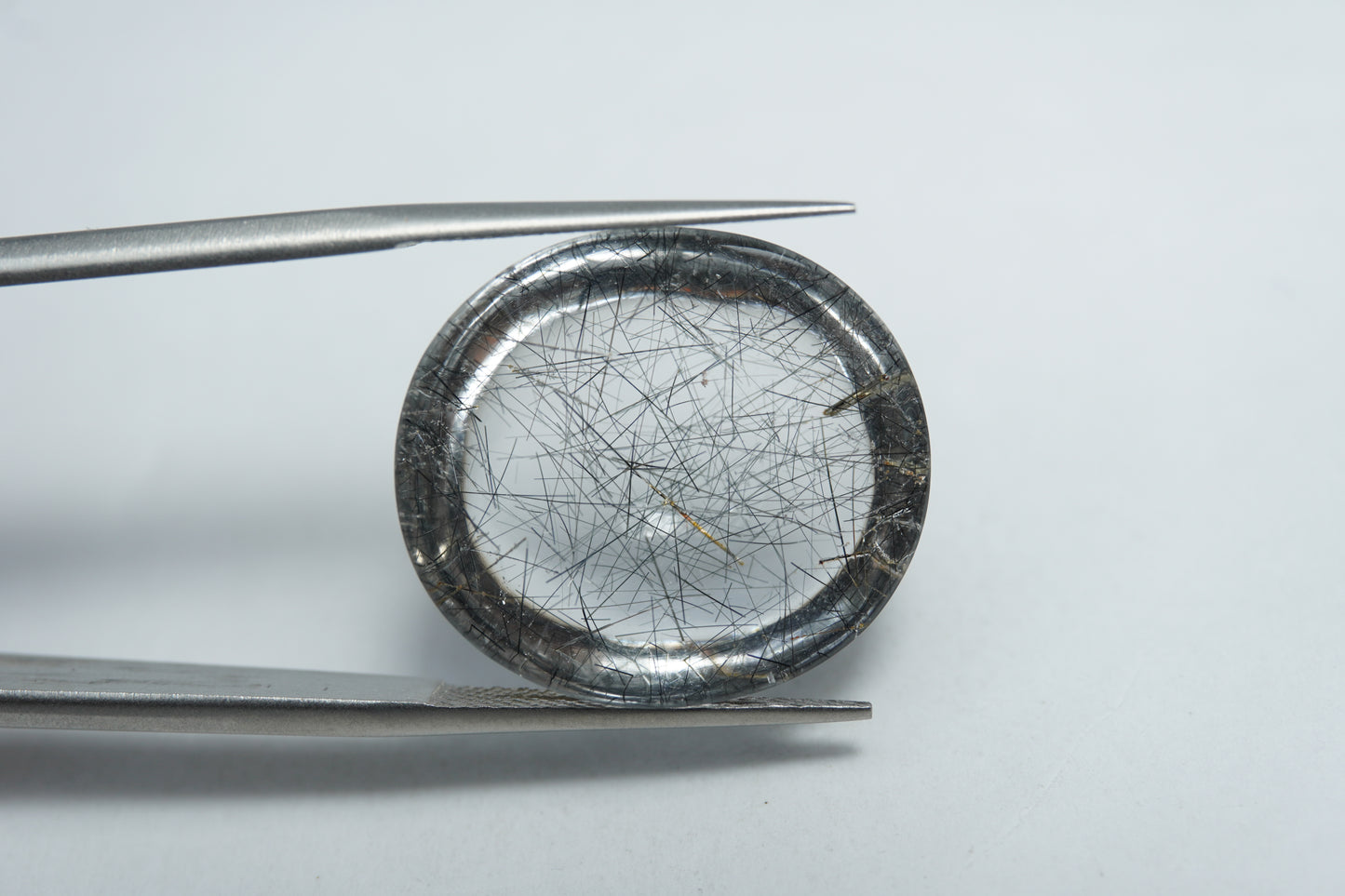 20.50ct Quartzo com inclusão cabochão 21x18mm