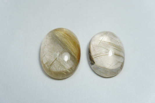 21.38ct Rutilo cabochão 16x13mm / 18x14mm