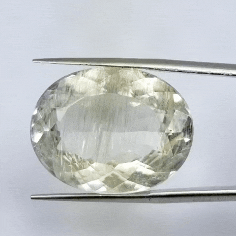41.15ct Topázio Com Agulhas  25x19mm