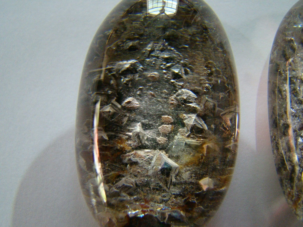 341ct Quartz With Mining (Cabochon)