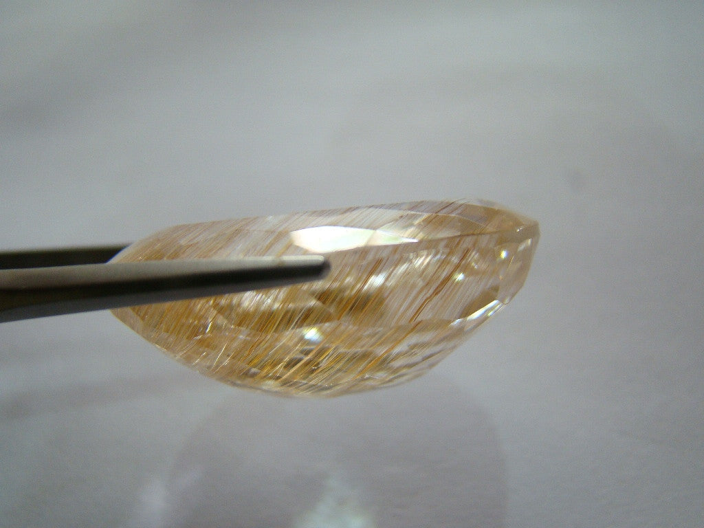 101ct Topaz With Golden Rutile